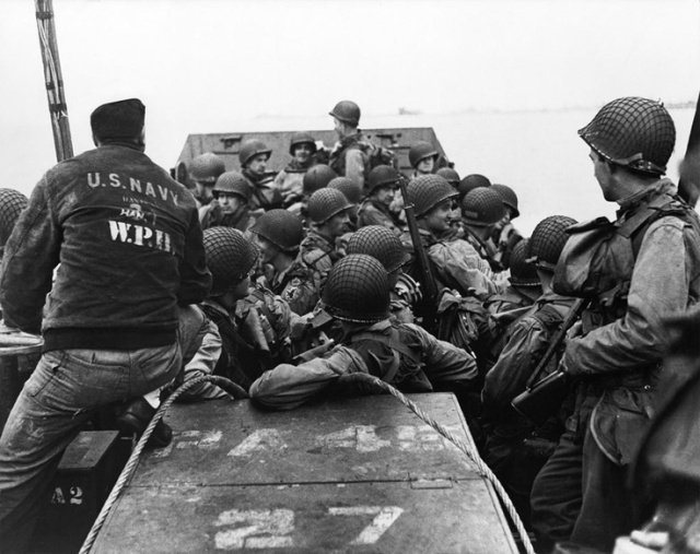 GIs of the 1st Infantry Division "Big Red One," leave port at Weymouth, England, for the invasion of Normandy on June 6th, 1944.  Photo by Robert Capa